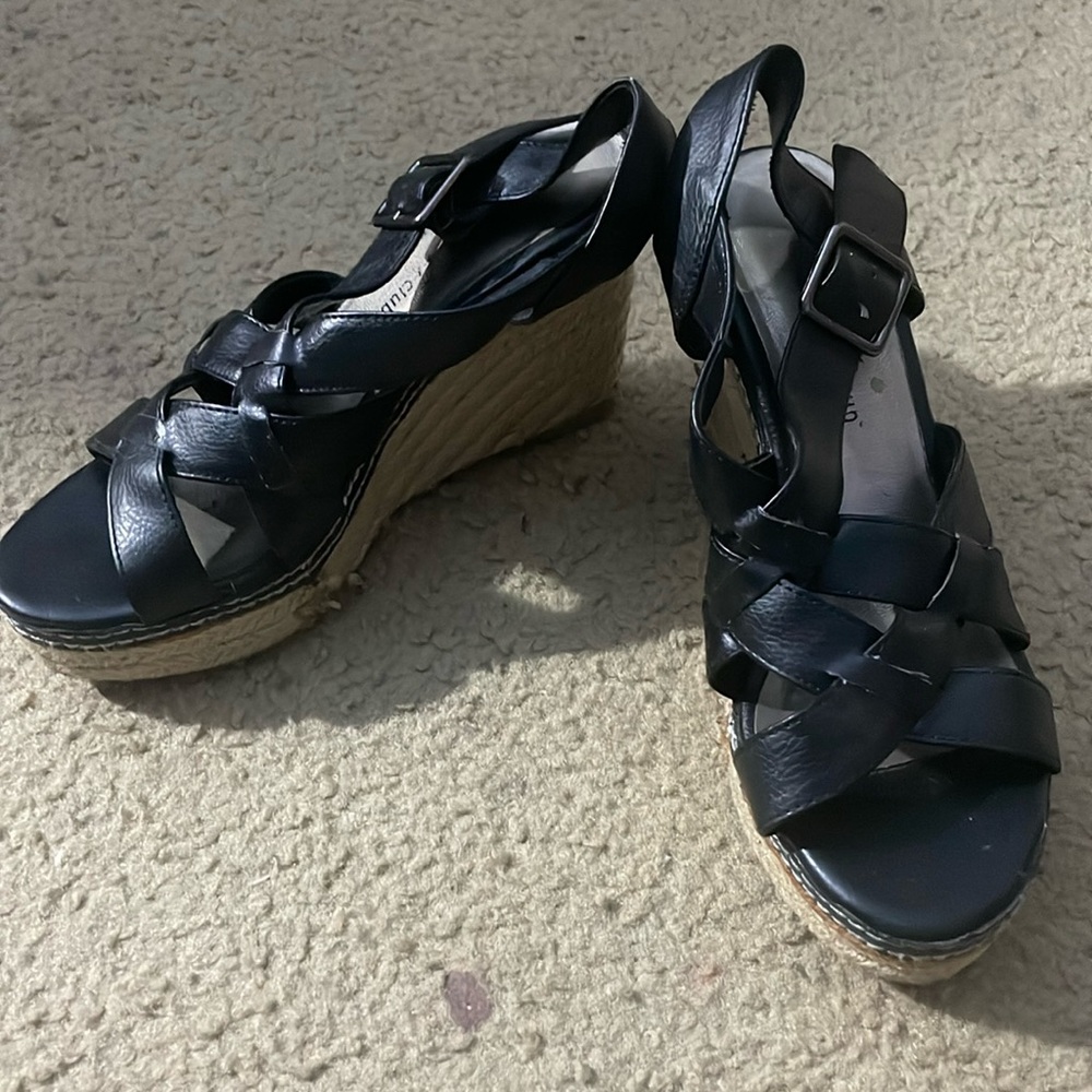 Black leather wedge sandals